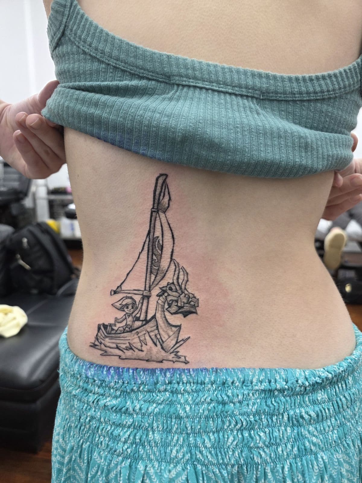 Sailing boat in fine linework down the back