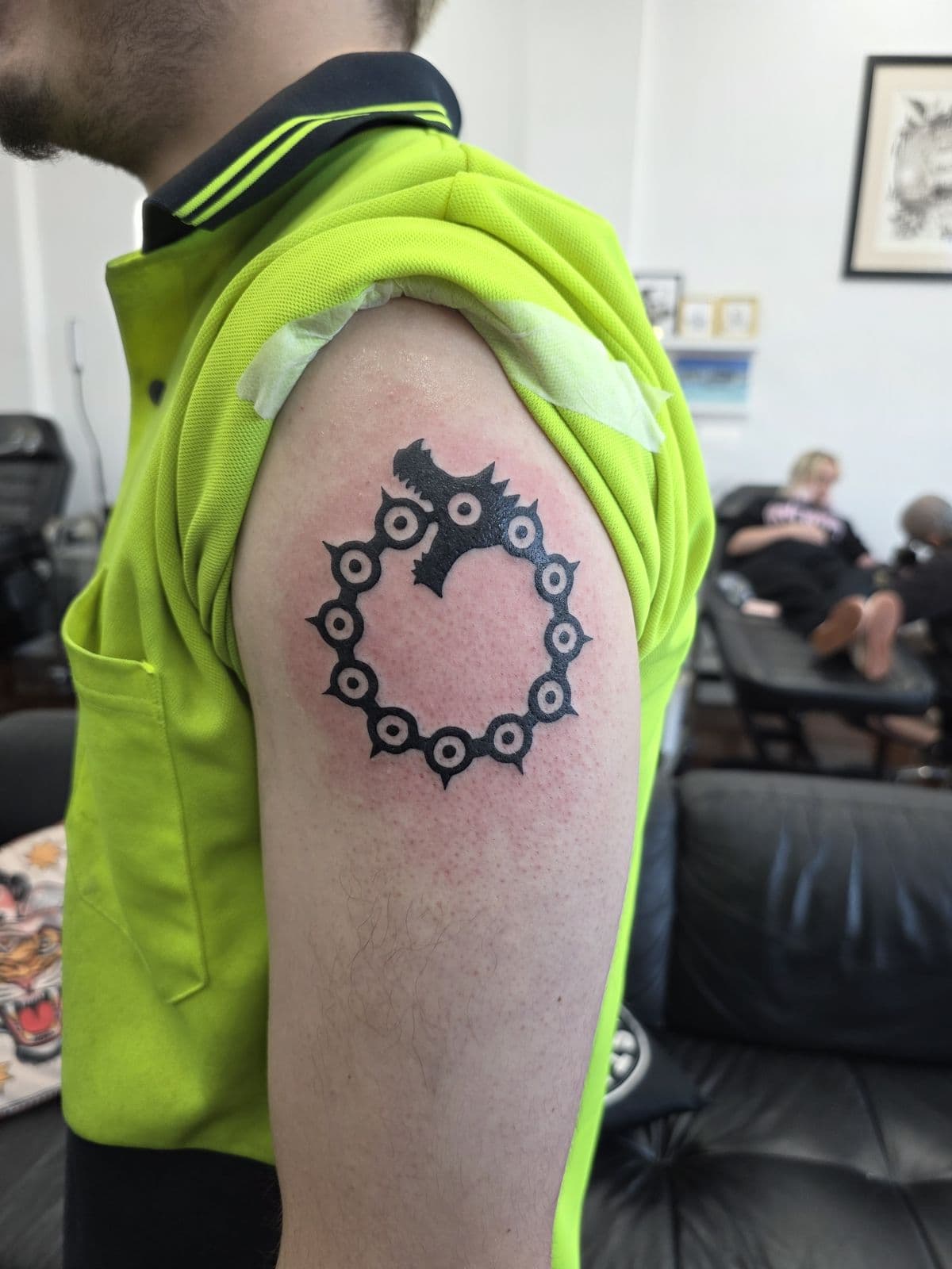Bold blackwork Seven Deadly Sins symbol, shoulder