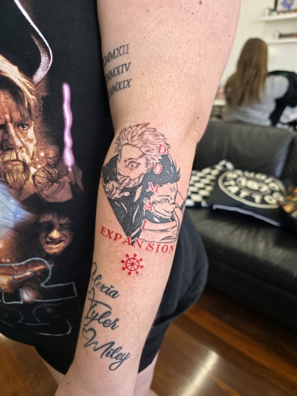 Anime portrait with red script, forearm