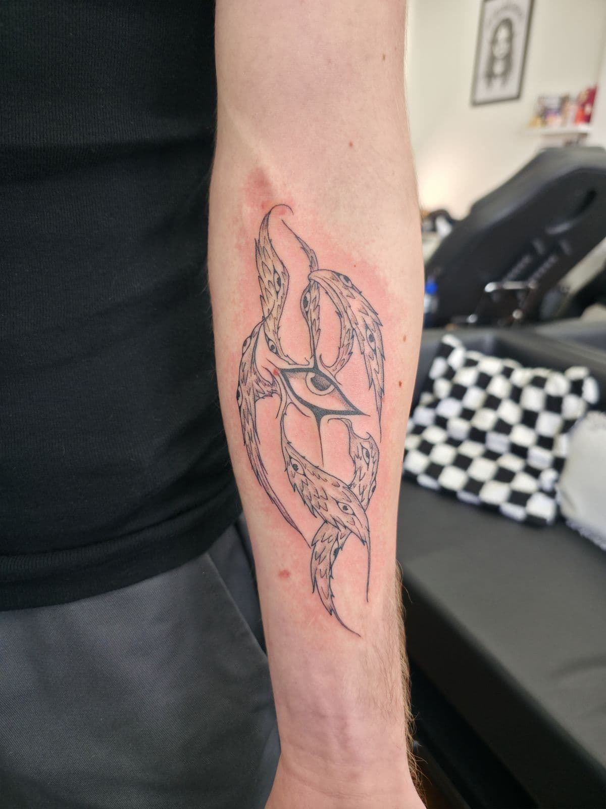 Ornamental eye and tentacle design, forearm